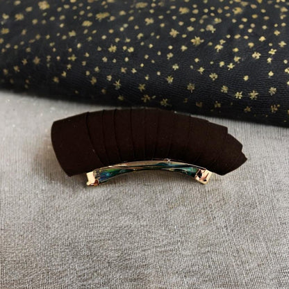 Elevate your hair game with these versatile Black Cotton Barrettes & Hair Clips, perfect for both short and long hair. Designed for effortless style, these chic accessories add a touch of elegance to any look.